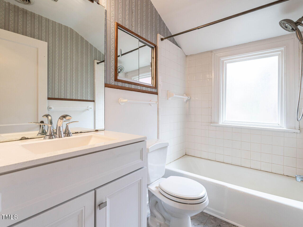 412 Morrison Avenue Raleigh, NC 27608 - Photo 19 of 26 a bathroom with a granite countertop sink toilet and shower