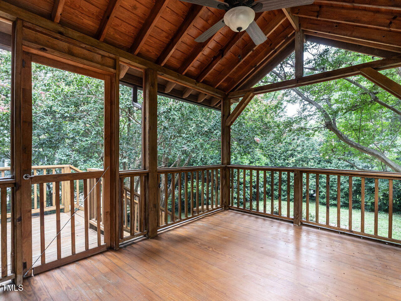 412 Morrison Avenue Raleigh, NC 27608 - Photo 21 of 26 a view of a balcony with wooden floor