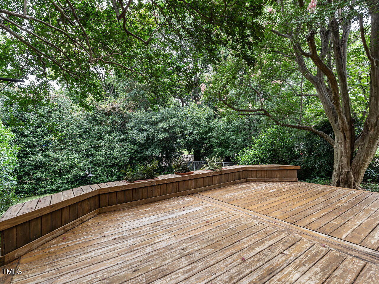412 Morrison Avenue Raleigh, NC 27608 - Photo 23 of 26 a view of a balcony with trees