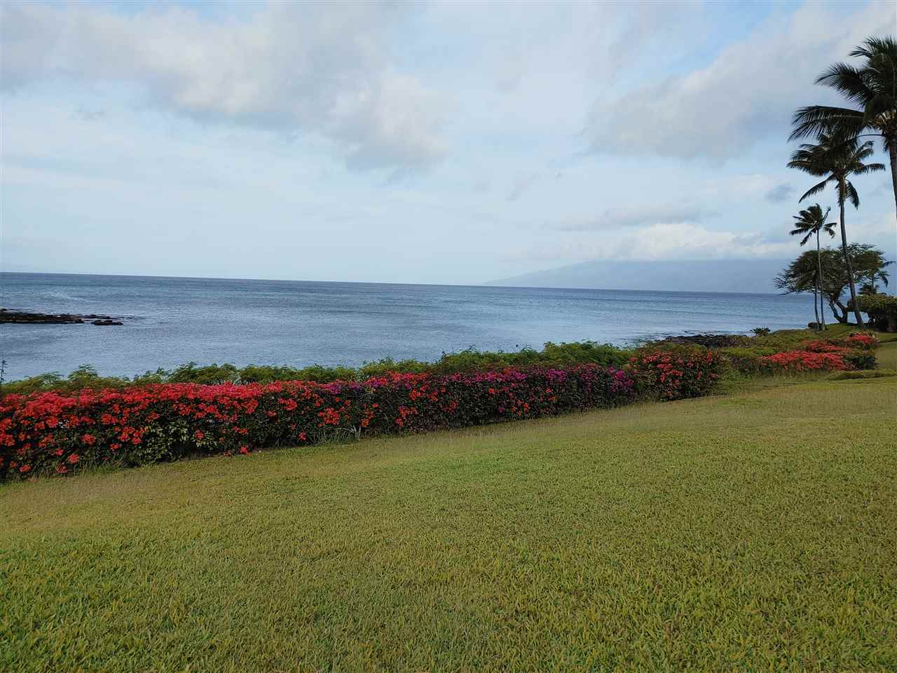 5295 Lower Honoapiilani Road, Unit A24 Lahaina, HI 96761 - Photo 14 of 23 a view of an ocean and beach