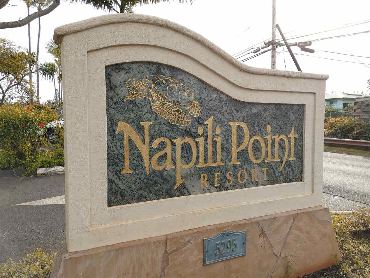 5295 Lower Honoapiilani Road, Unit A24 Lahaina, HI 96761 - Photo 10 of 23 a view of a door with a sign broad