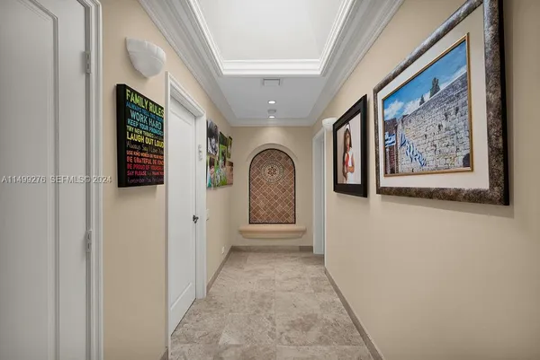 a view of gallery with mirror