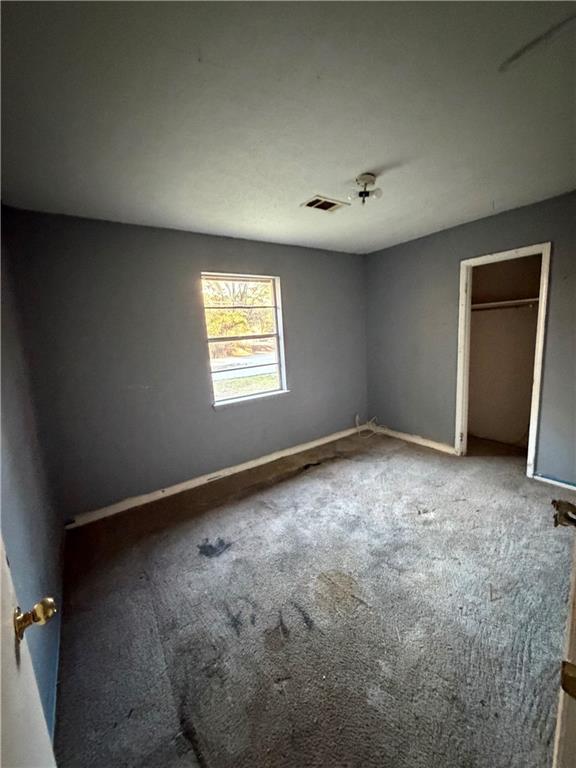 1775 Highpoint Road Snellville, GA 30078 - Photo 8 of 11 an empty room with a window