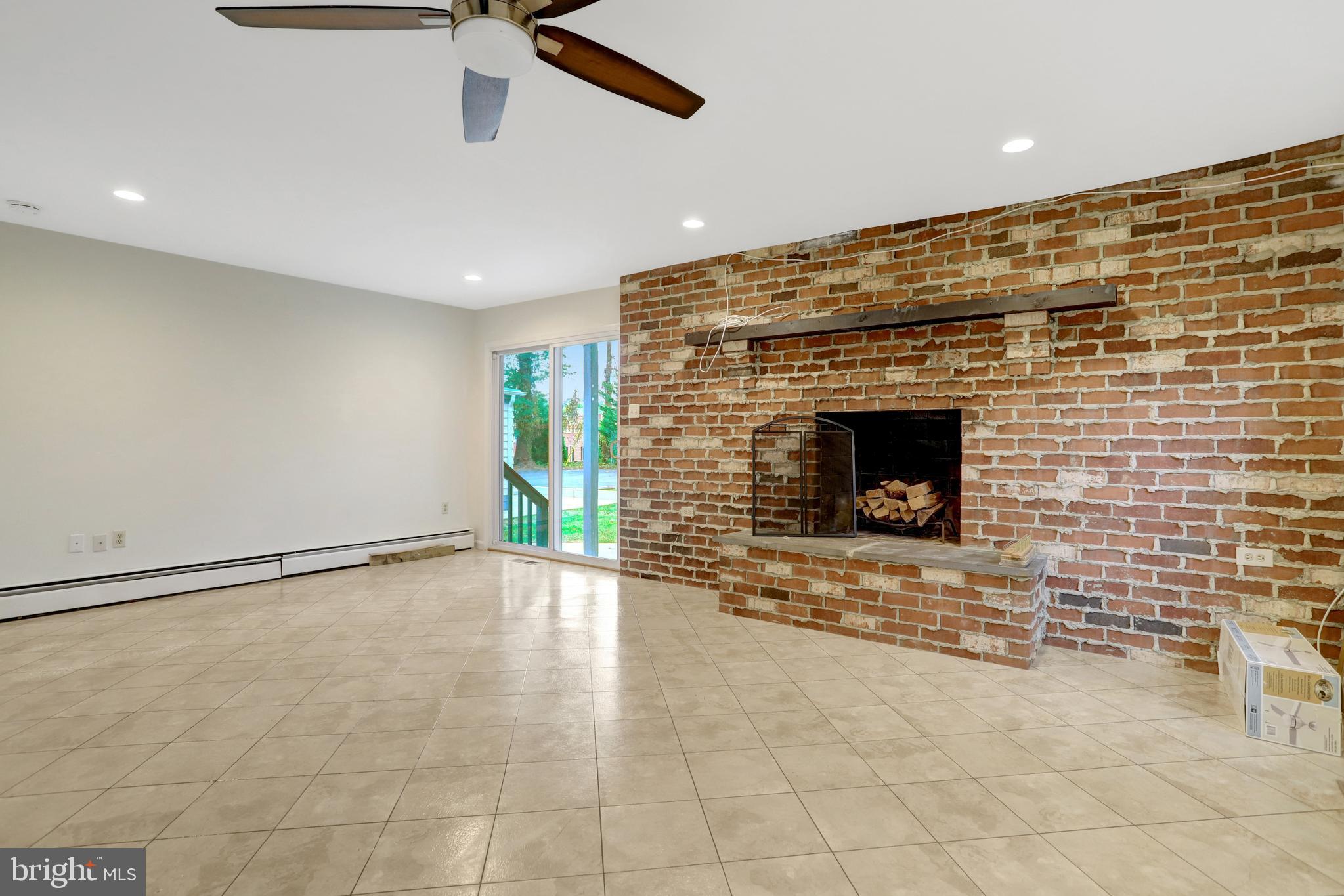 411 North Bryan Street Arlington, VA 22201 - Photo 19 of 58 a view of an empty room and fire place