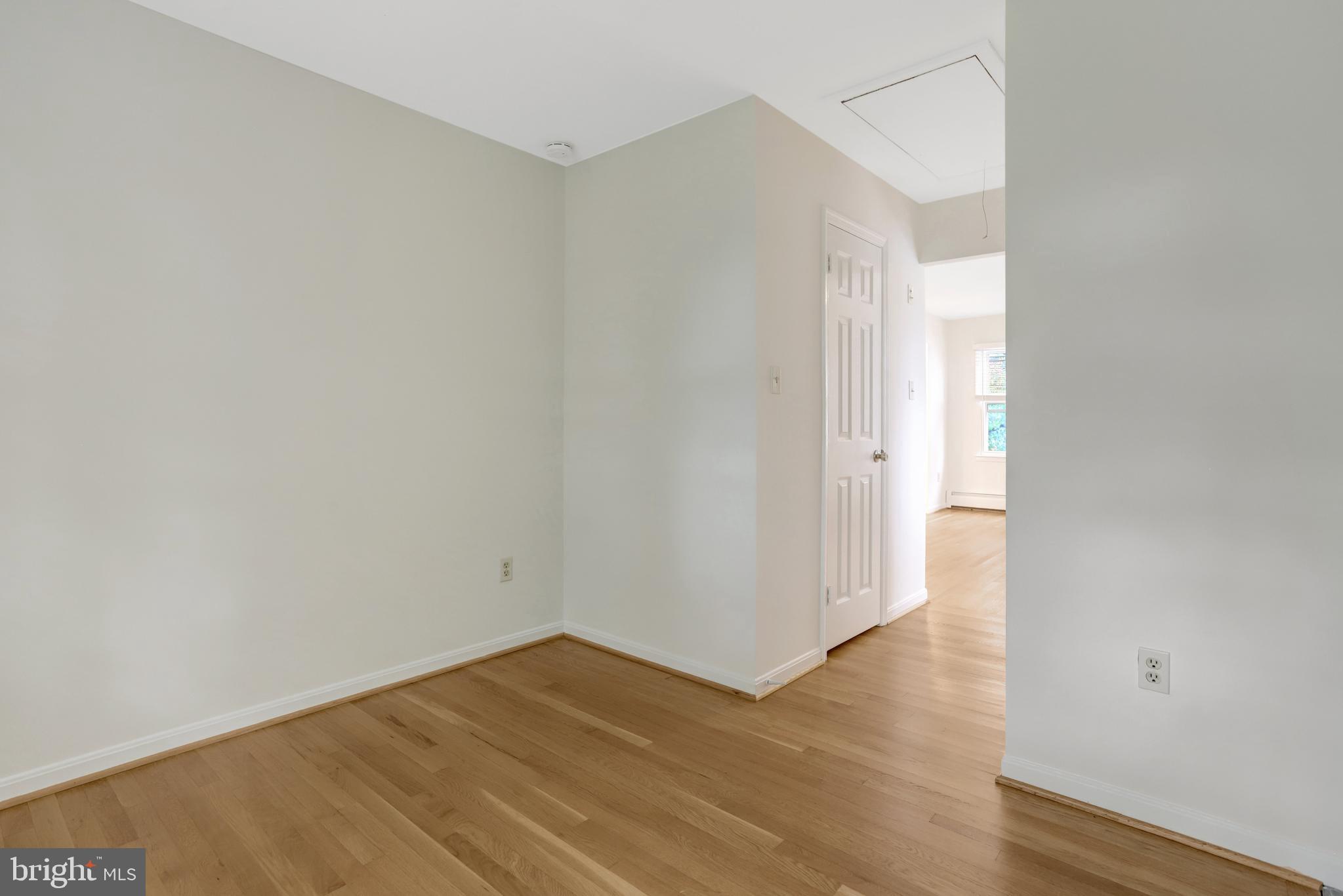 411 North Bryan Street Arlington, VA 22201 - Photo 29 of 58 a view of an empty room with wooden floor