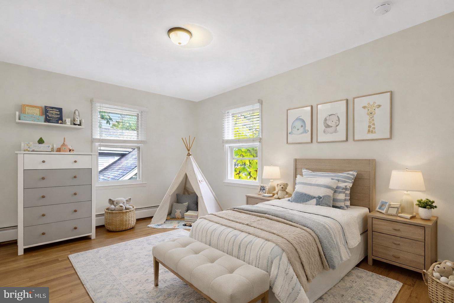 411 North Bryan Street Arlington, VA 22201 - Photo 35 of 58 a bedroom with a bed and a window