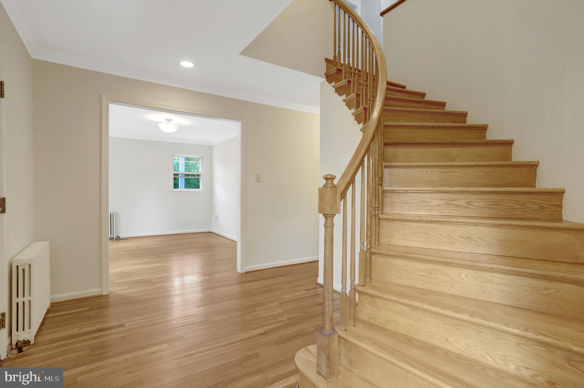 411 North Bryan Street Arlington, VA 22201 - Photo 4 of 58 a view of entryway and hall with wooden floor