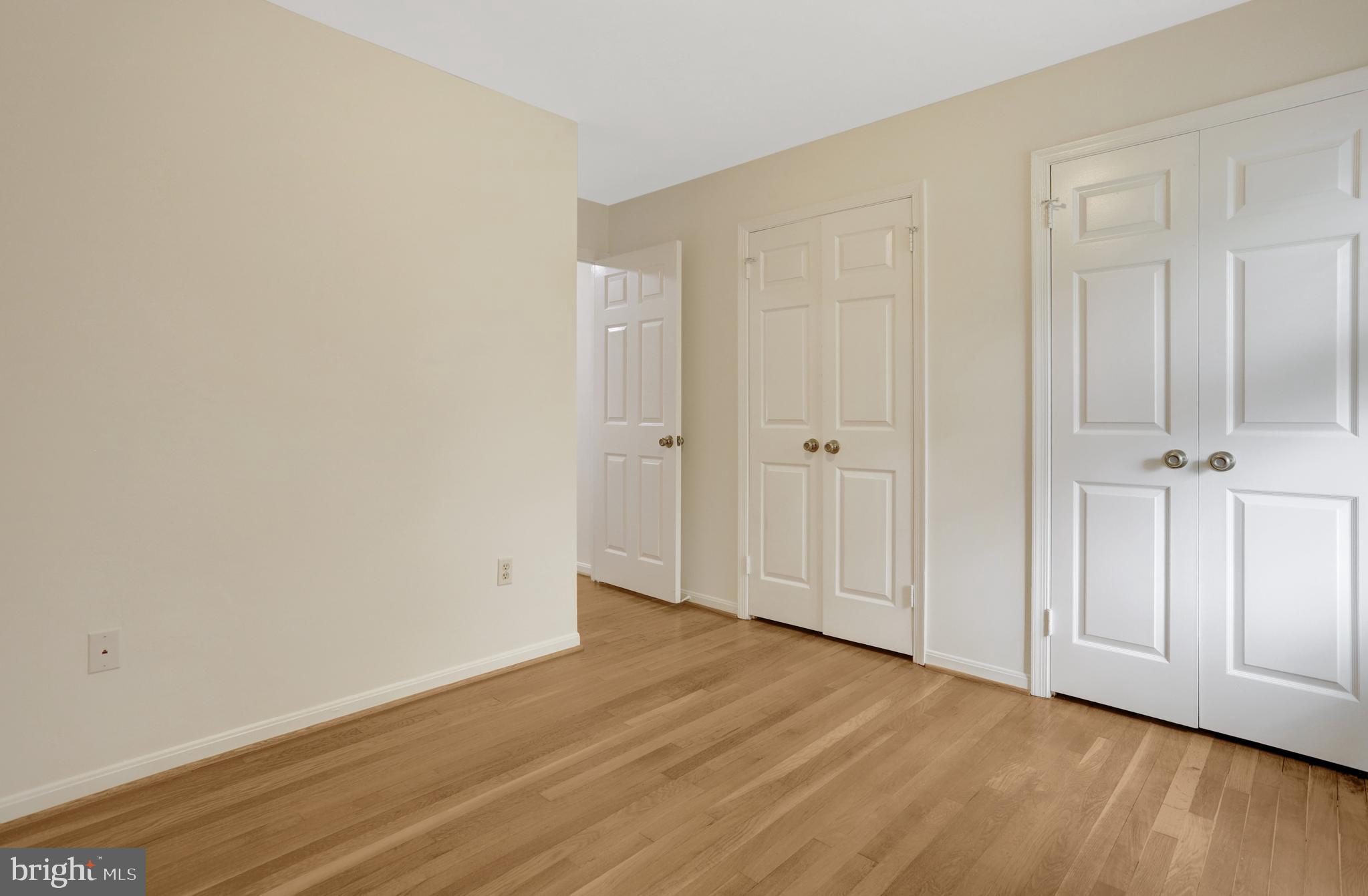 411 North Bryan Street Arlington, VA 22201 - Photo 46 of 58 an empty room with wooden floor