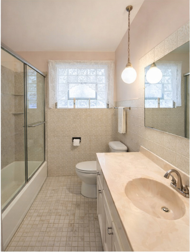 7332 Beloit Avenue Bridgeview, IL 60455 - Photo 16 of 21 a bathroom with a sink a toilet and shower