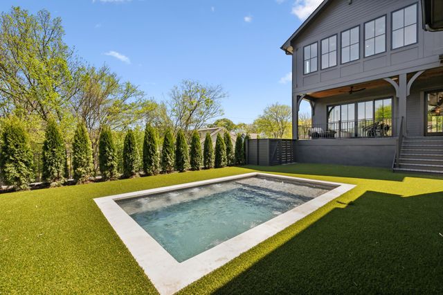 a view of swimming pool with patio