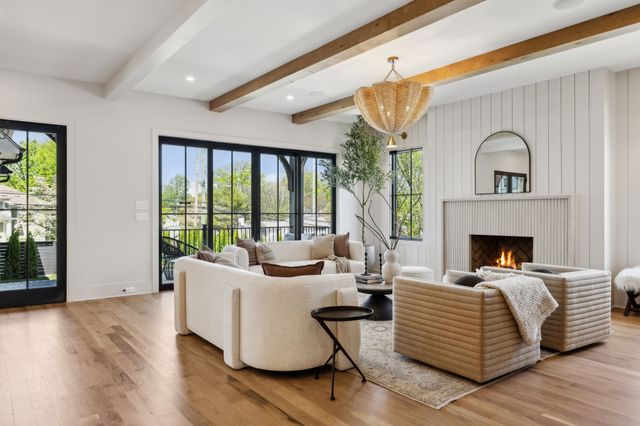 a view of a house with potted plants