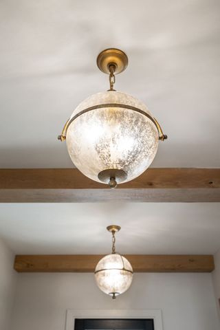 a kitchen with a refrigerator and a sink