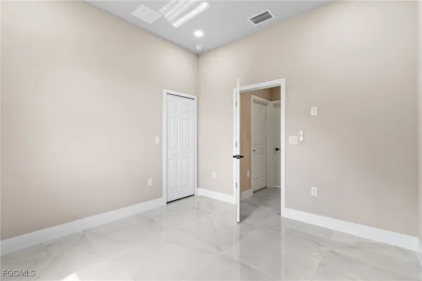an empty room with closet