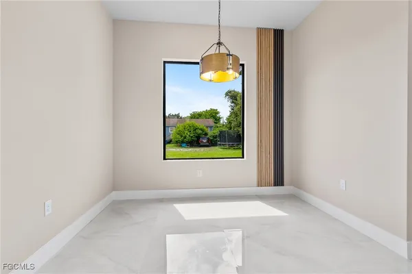 a kitchen with stainless steel appliances a refrigerator sink and stove