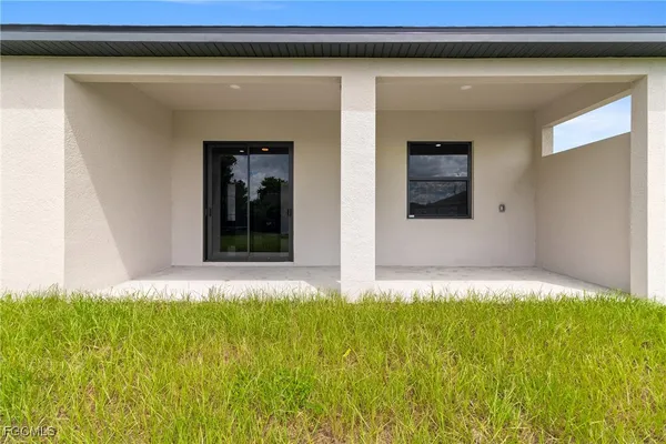 a view of a room with storage and utility room