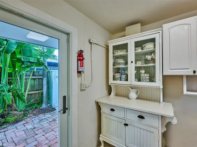 a bathroom with a sink and a window