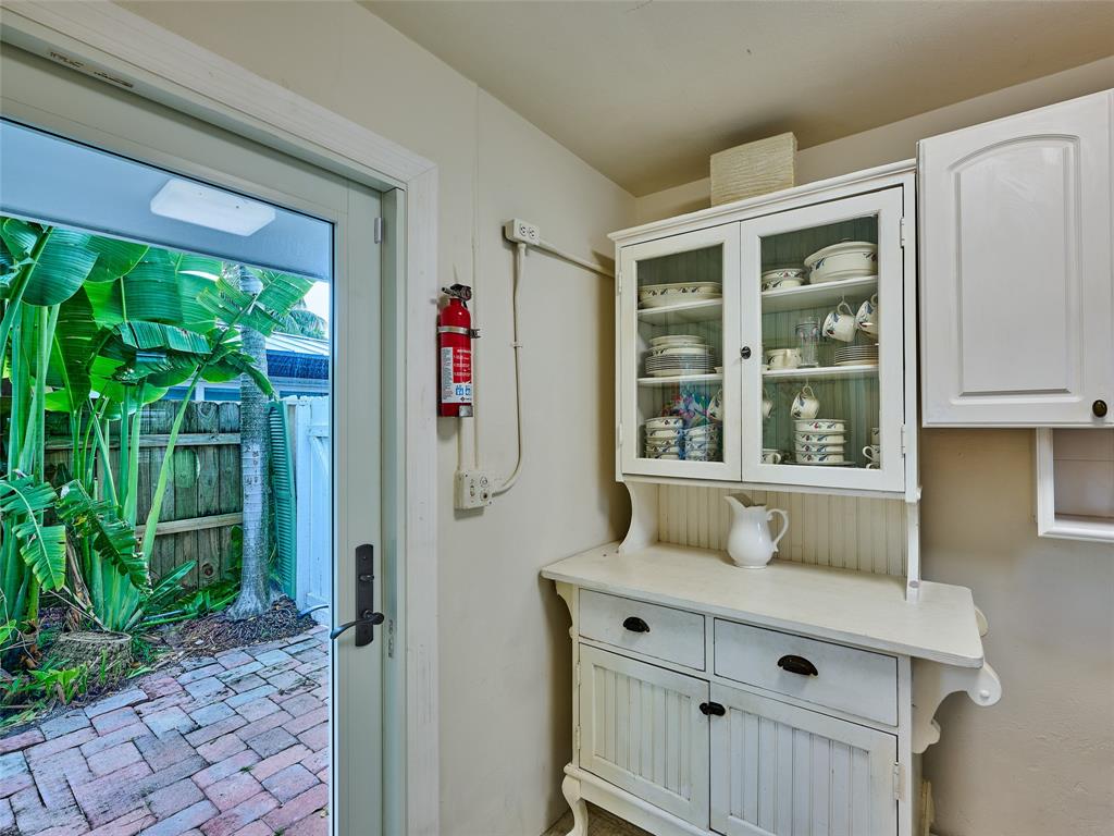 3220 Oleander Way Lauderdale-by-the-Sea, FL 33062 - Photo 19 of 50 a bathroom with a sink and a window