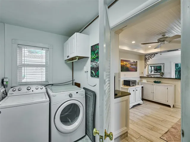a view of kitchen and washer and dryer