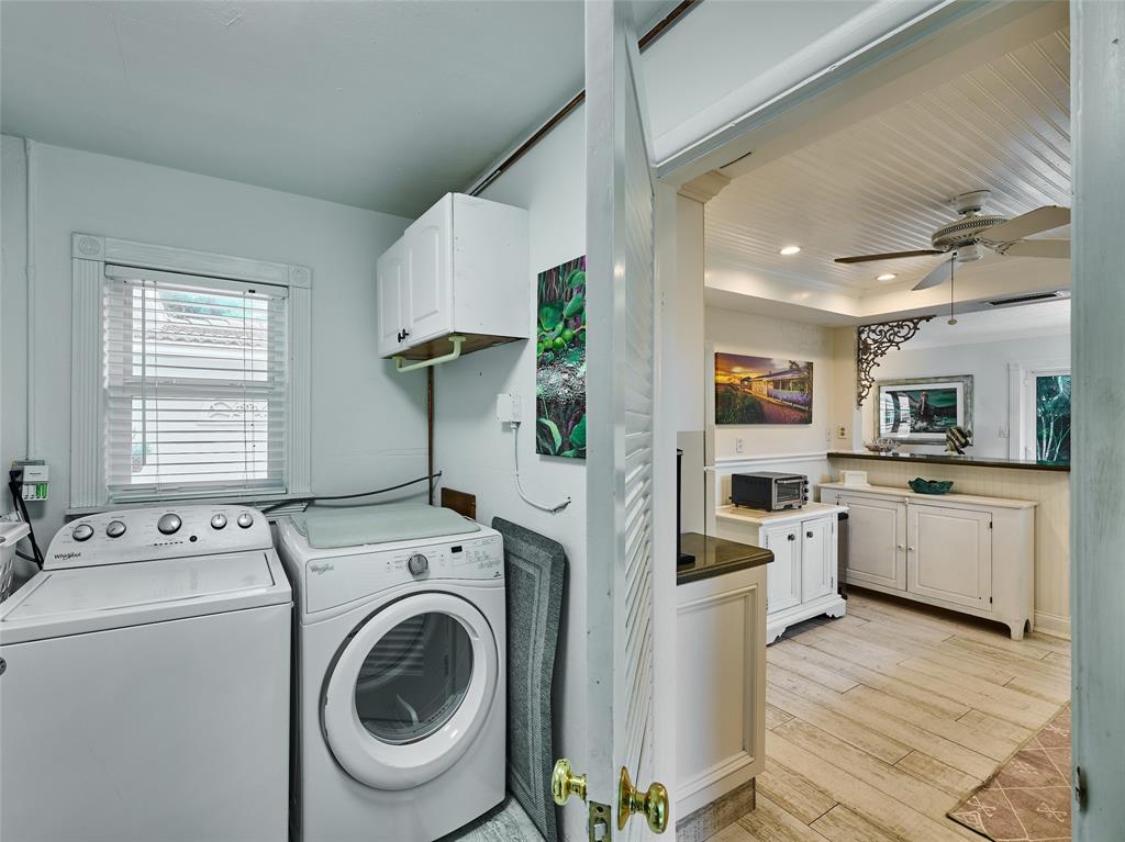 3220 Oleander Way Lauderdale-by-the-Sea, FL 33062 - Photo 20 of 50 a view of kitchen and washer and dryer