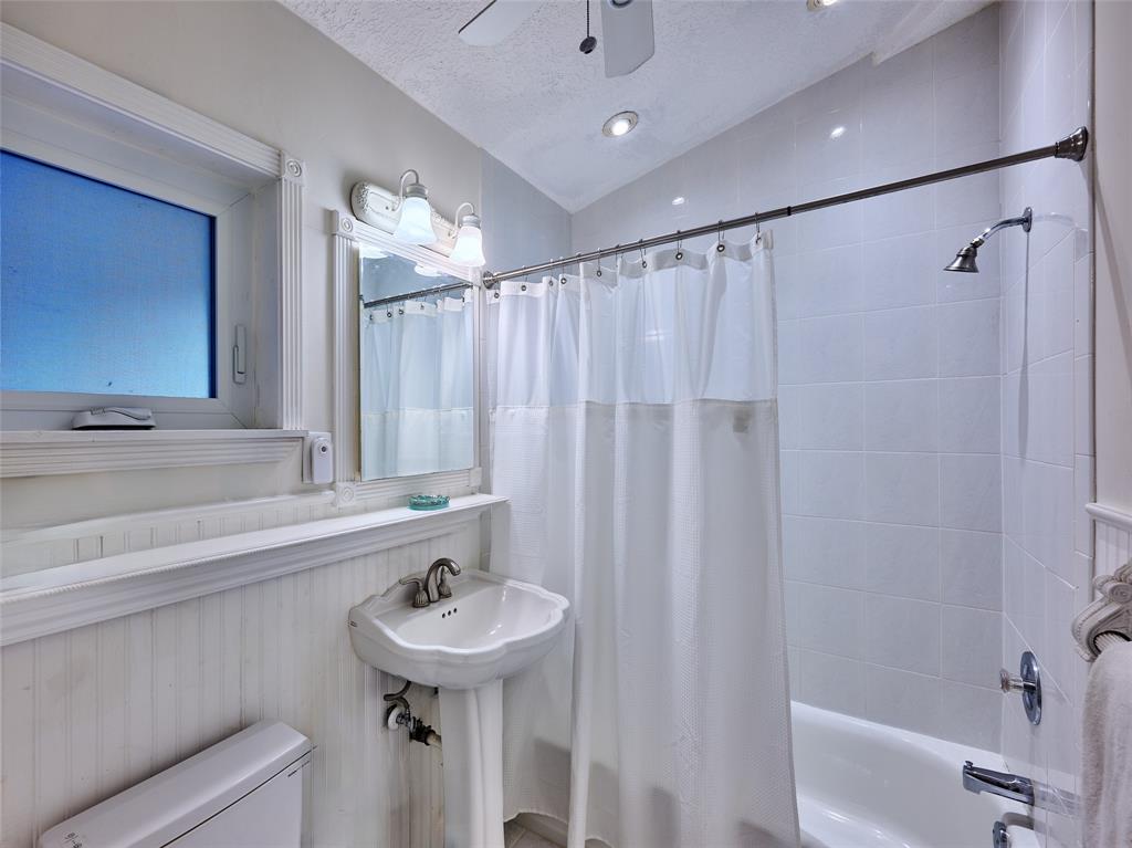 3220 Oleander Way Lauderdale-by-the-Sea, FL 33062 - Photo 22 of 50 a bathroom with a sink a toilet and shower