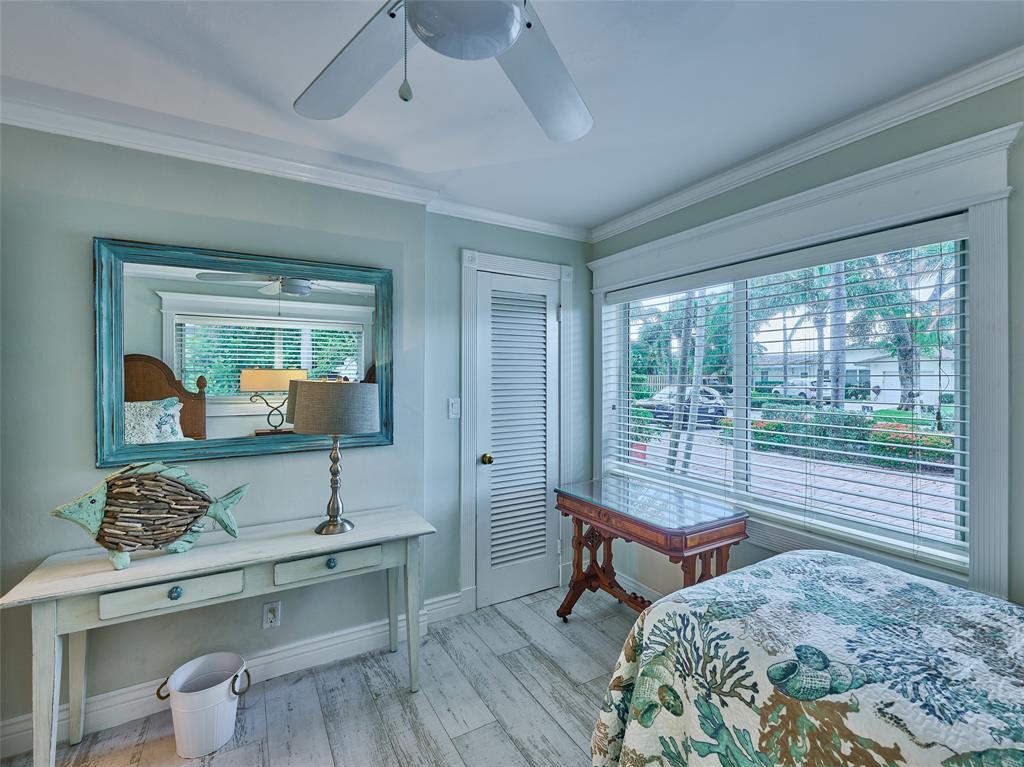 3220 Oleander Way Lauderdale-by-the-Sea, FL 33062 - Photo 23 of 50 a living room with furniture and a window