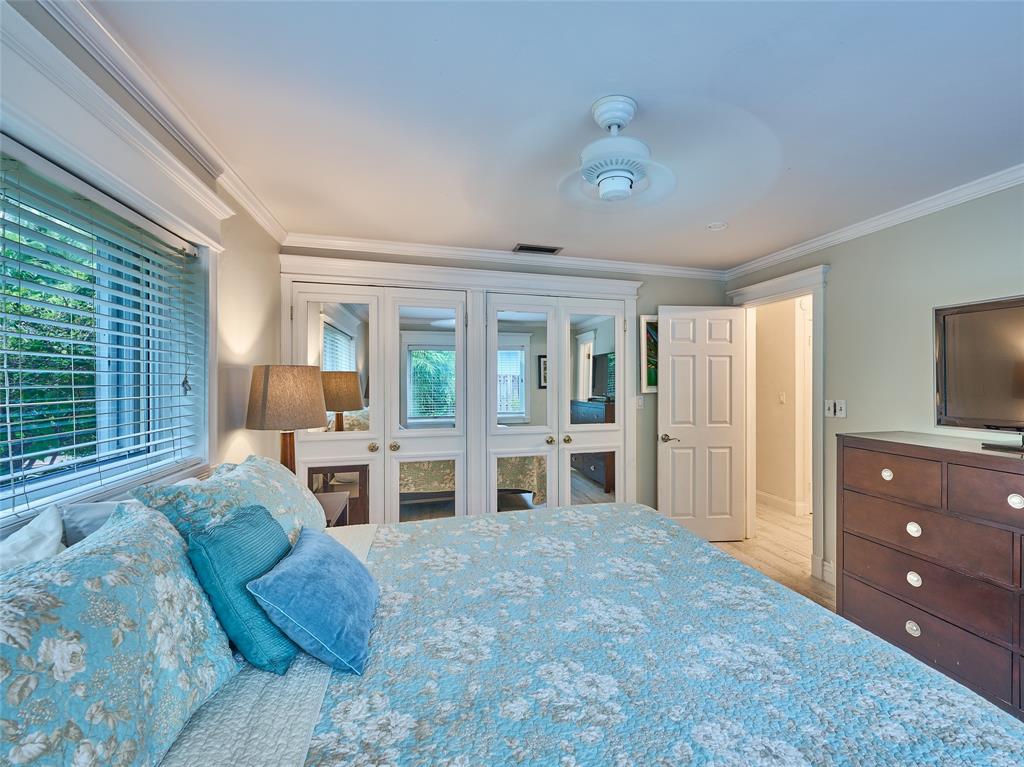 3220 Oleander Way Lauderdale-by-the-Sea, FL 33062 - Photo 27 of 50 a living room with furniture and a flat screen tv