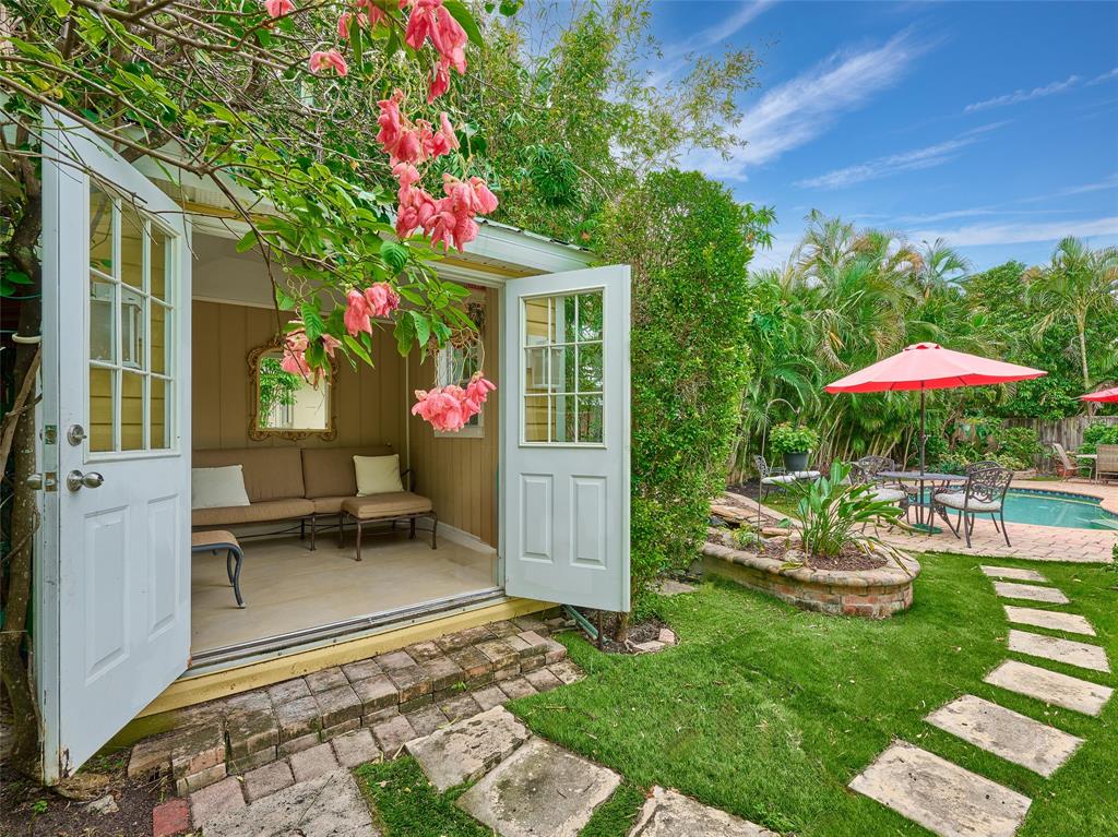 3220 Oleander Way Lauderdale-by-the-Sea, FL 33062 - Photo 34 of 50 a front view of a house with a yard