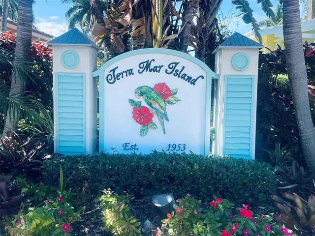 a sign that is on a wooden wall