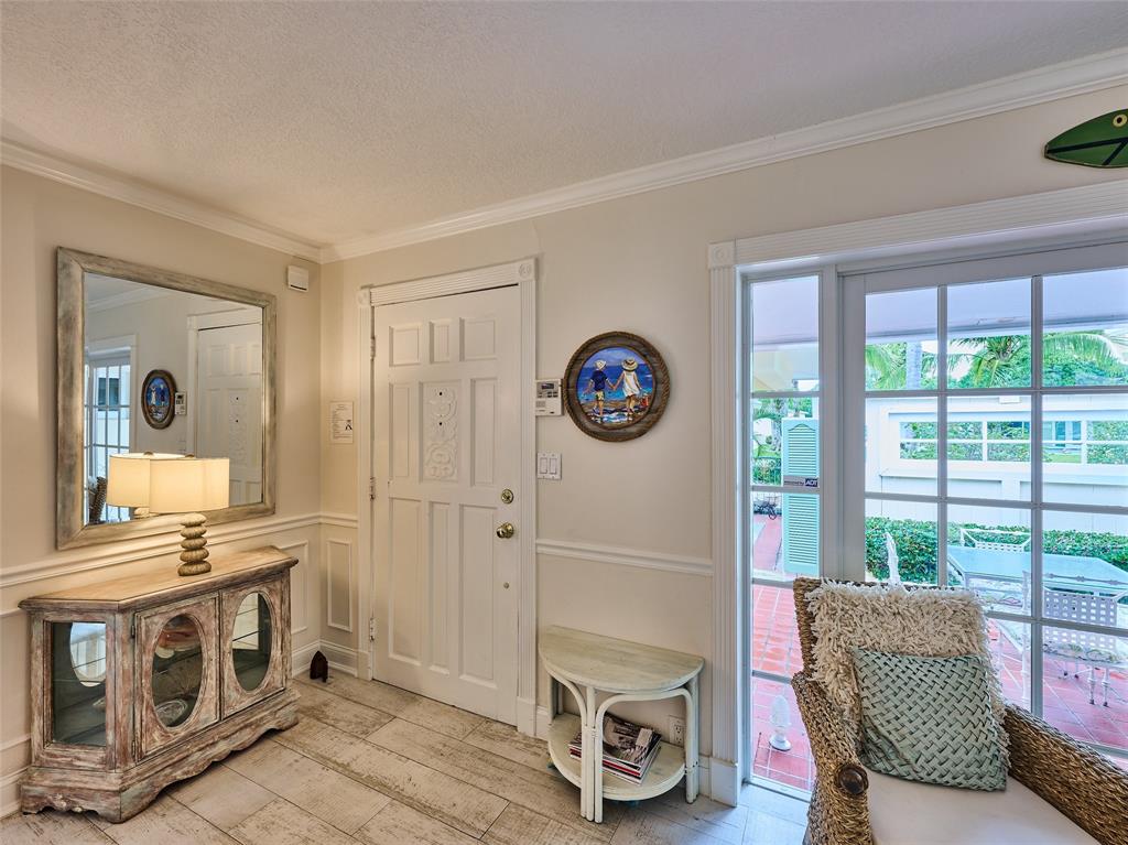 3220 Oleander Way Lauderdale-by-the-Sea, FL 33062 - Photo 6 of 50 a view of livingroom with furniture and a fireplace