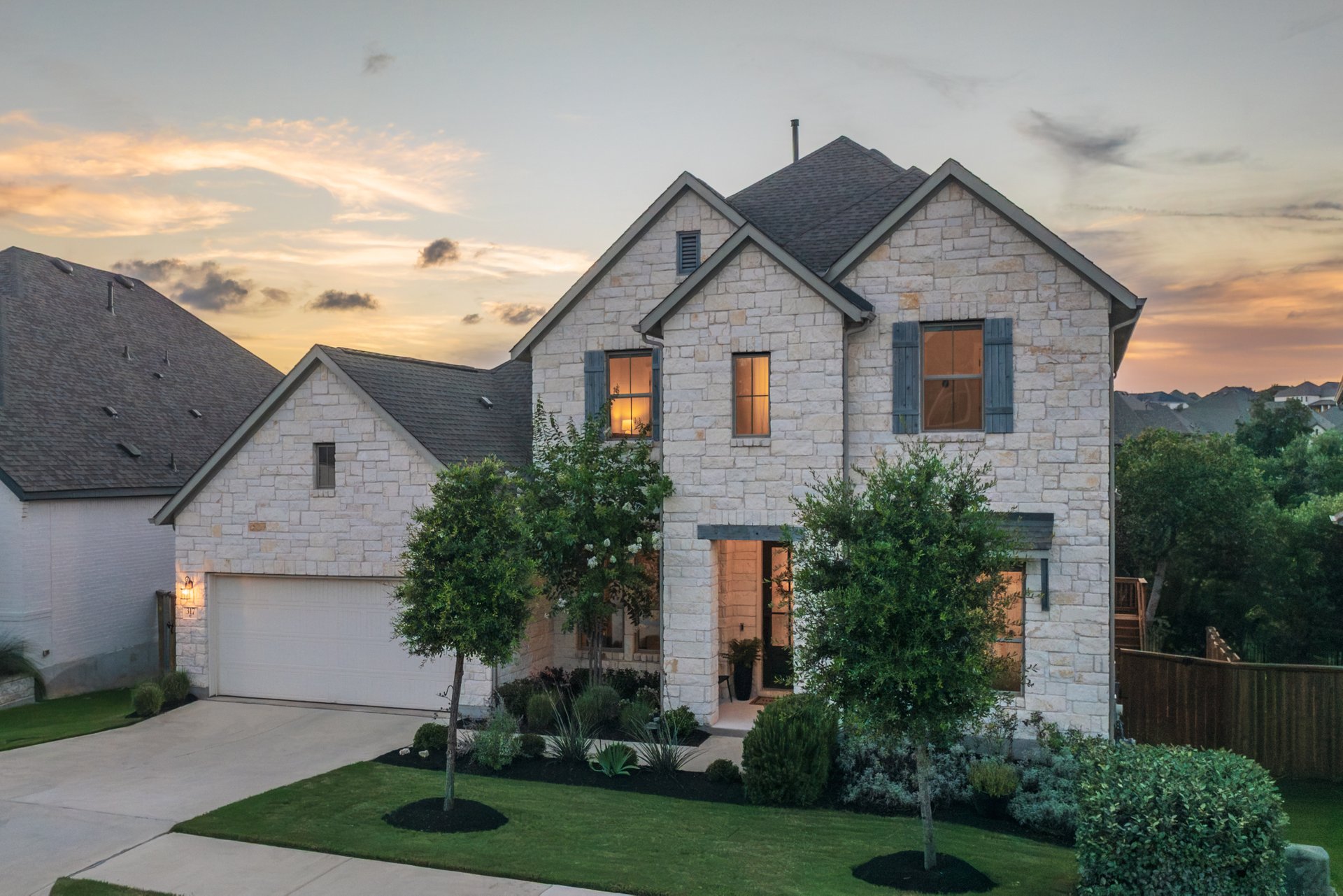 317 Autumn Oak Way Georgetown, TX 78628 - Photo 22 of 40 a front view of a house with a yard and garage