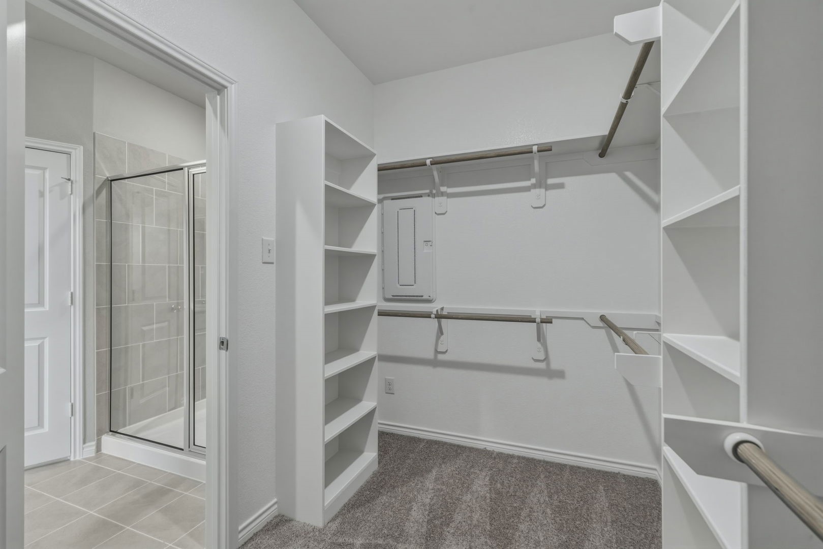 31010 Rena Coast Drive Huffman, TX 77336 - Photo 18 of 28 Primary Closet in the Cedar home plan by Trophy Signature Homes – REPRESENTATIVE PHOTO