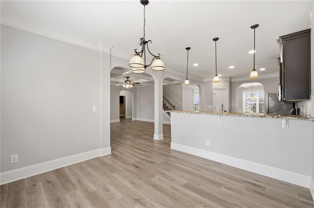 268 Clubhouse Crossing Acworth, GA 30101 - Photo 19 of 48 a view of a room with wooden floor