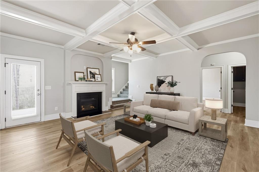 268 Clubhouse Crossing Acworth, GA 30101 - Photo 20 of 48 a living room with furniture a fireplace and a table