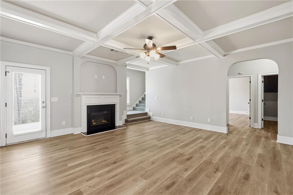268 Clubhouse Crossing Acworth, GA 30101 - Photo 21 of 48 wooden floor fireplace and windows in a room