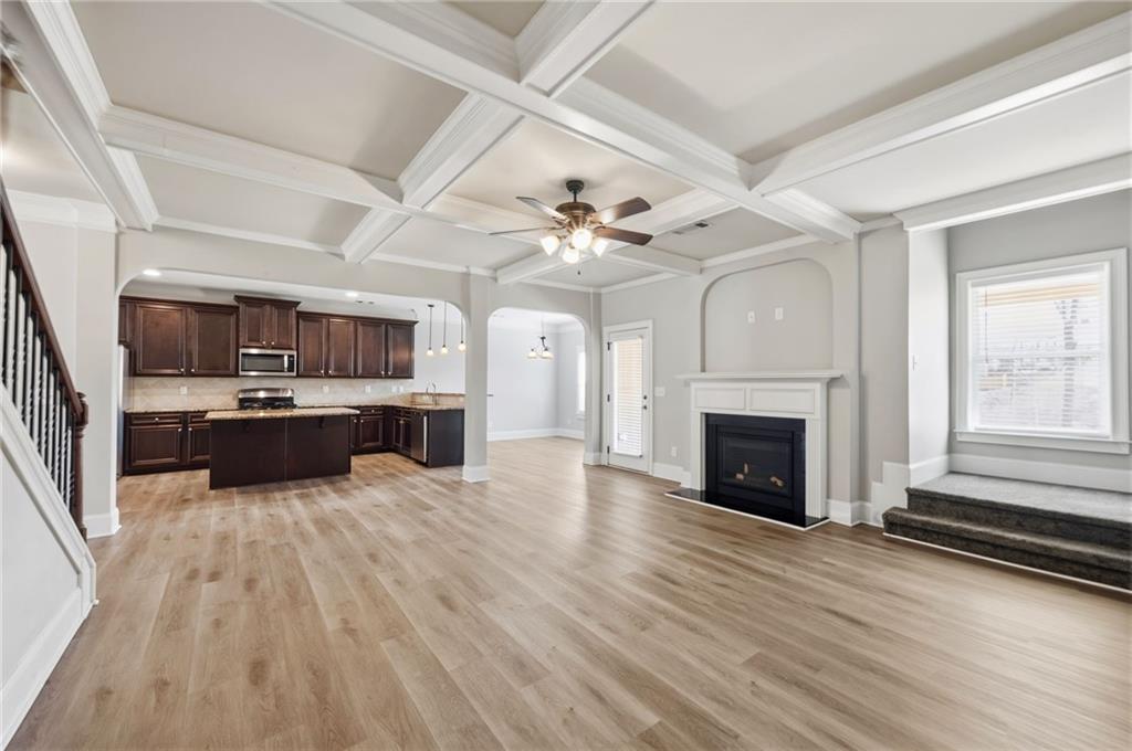 268 Clubhouse Crossing Acworth, GA 30101 - Photo 26 of 48 a large white kitchen with a large window a oven and appliances