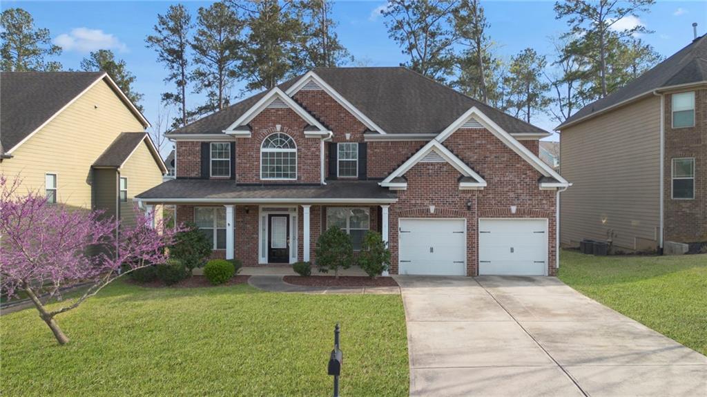 268 Clubhouse Crossing Acworth, GA 30101 - Photo 3 of 48 a view of a house with a yard
