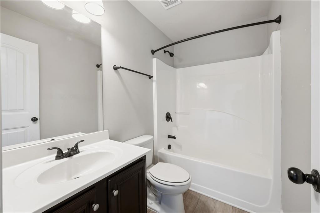 268 Clubhouse Crossing Acworth, GA 30101 - Photo 42 of 48 a bathroom with a sink and a mirror