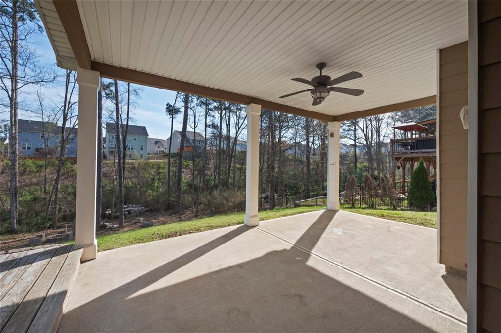 268 Clubhouse Crossing Acworth, GA 30101 - Photo 43 of 48 a view of a room with porch and wooden floor