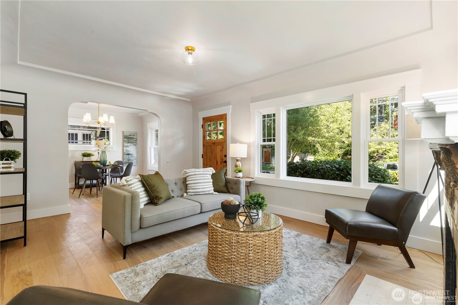3221 36th Avenue South Seattle, WA 98144 - Photo 2 of 13 a living room with furniture and a large window