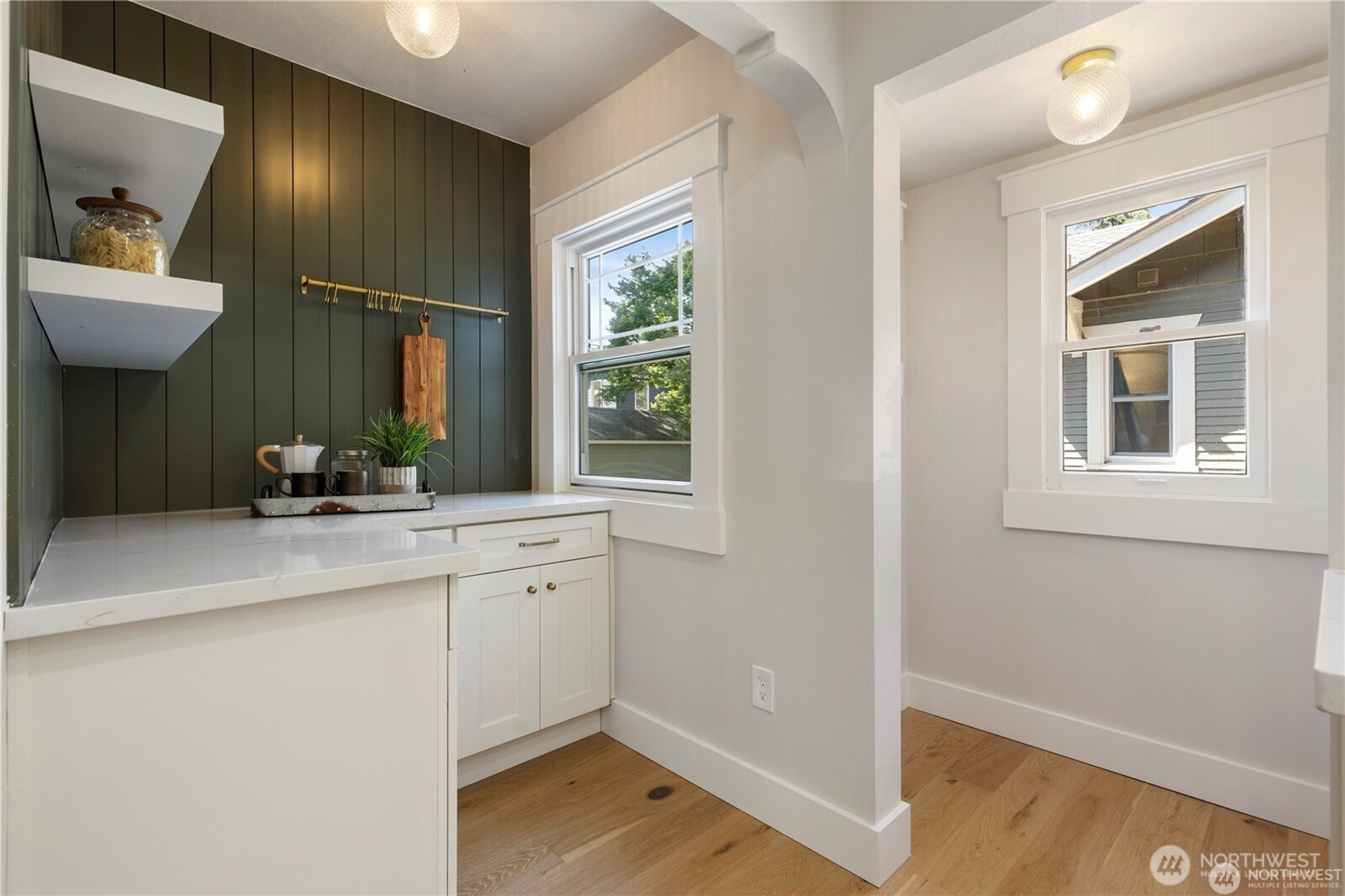 3221 36th Avenue South Seattle, WA 98144 - Photo 5 of 13 a bathroom with a sink and a mirror