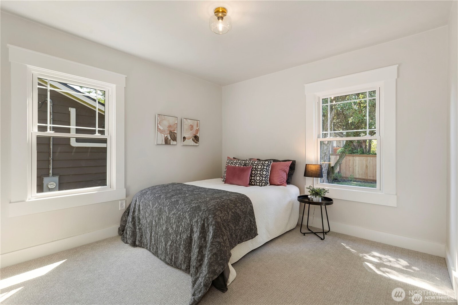 3221 36th Avenue South Seattle, WA 98144 - Photo 6 of 13 a bedroom with a bed and a window