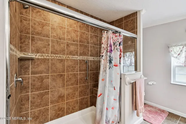 a kitchen that has a table and chairs in it