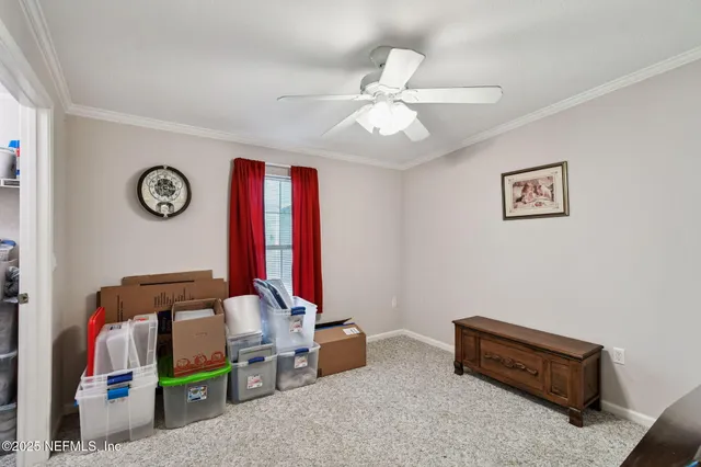 a spacious bathroom with a granite countertop sink and a mirror
