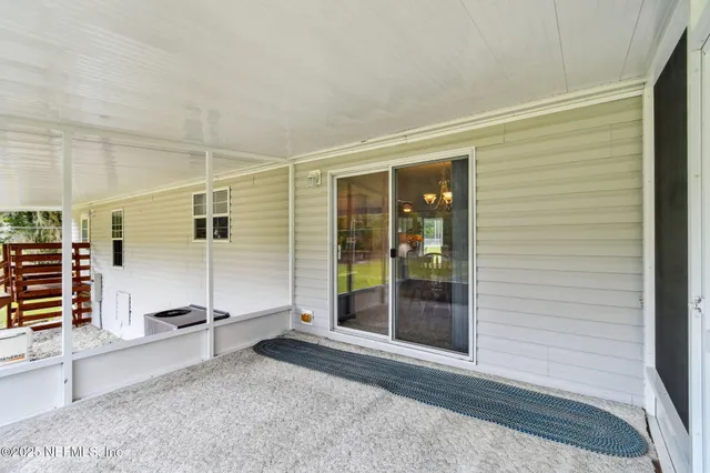 an empty room with closet area