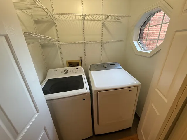 a utility room with dryer and washer