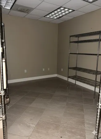 a view of a room with racks on the wall