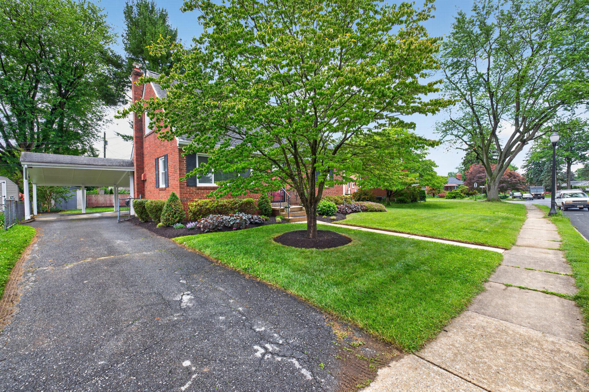 1002 Wilson Place Frederick, MD 21702 - Photo 28 of 30 a front view of a house with garden