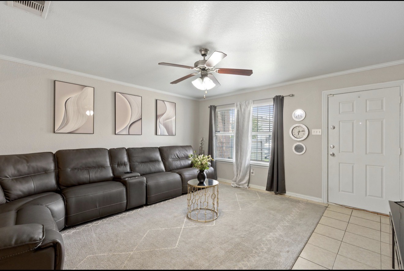 7118 Rising Brook Drive Cypress, TX 77433 - Photo 3 of 21 a living room with furniture and a chandelier
