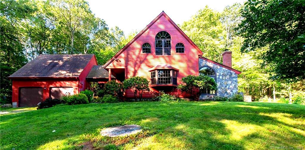45 Center Road Woodstock, CT 06281 - Photo 1 of 1 a view of a house with a yard and potted plants