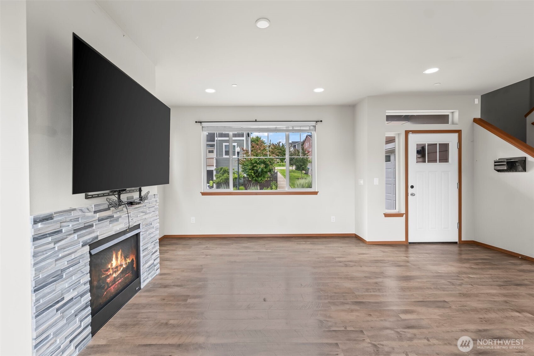 2540 Filbert Avenue Bremerton, WA 98310 - Photo 4 of 28 a view of livingroom with hardwood floor and flat screen tv
